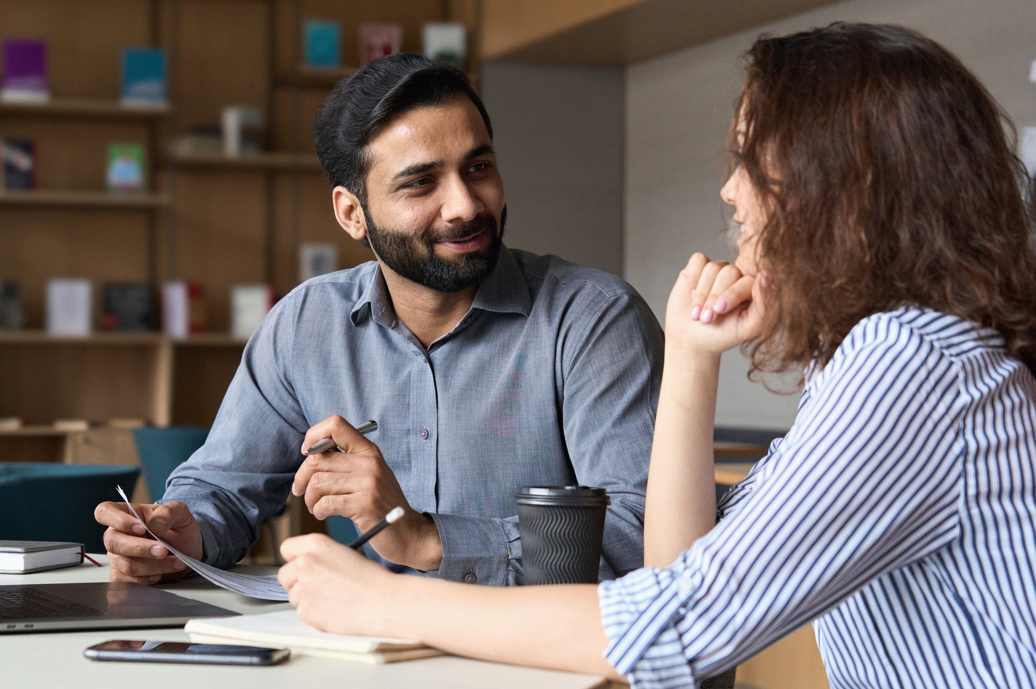 workers talking in a meeting